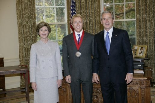 President George W. Bush and Laura Bush stand with 2005 National Humanities Medal recipient Leigh Keno, art historian and appraiser, Thursday, Nov. 10, 2005 in the Oval Office at the White House. White House photo by Eric Draper