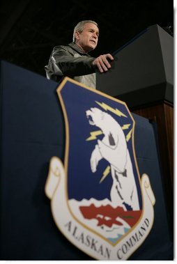 President George W. Bush speaks from the podium inside Hangar One at Elmendorf Air Force Base Monday, Nov. 14, 2005, during his remarks on the War on Terror. The Anchorage stop was his first of a seven-day trip to Asia.  White House photo by Eric Draper
