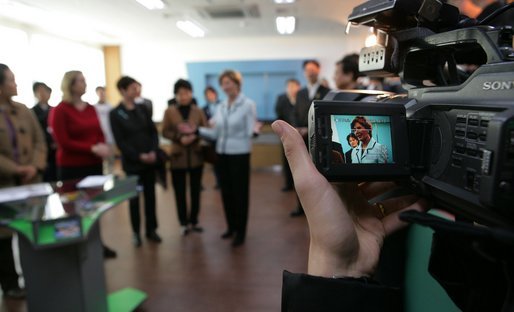 The liquid crystal display of a video camera captures Mrs. Laura Bush as she visits one of three classrooms Thursday, Nov. 17, 2005, at the Gyeongju English Village in Gyeongju, Korea. White House photo by Shealah Craighead
