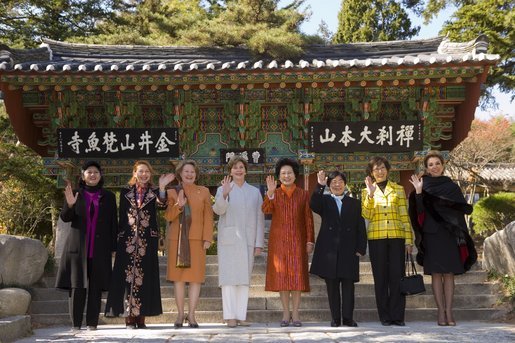 Other spouses of APEC leaders join Laura Bush Friday, Nov. 18, 2005, for a group photo at the Beomeosa Temple in Busan, Korea. White House photo by Shealah Craighead