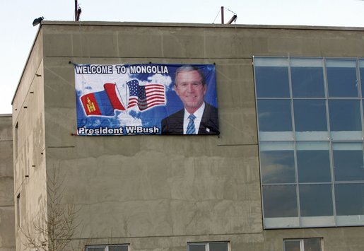 A sign welcoming "George and Laura" to Mongolia adorns a building at Buyant-Ukhaa Airport in Ulaanbaatar, Mongolia, as the President and First Lady arrived on the last stop of their Asia tour. White House photo by Paul Morse