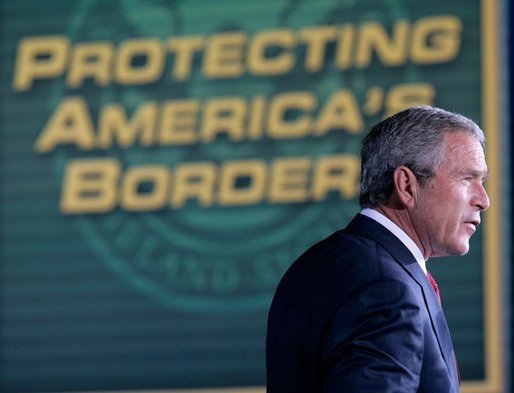 President George W. Bush addresses an audience Monday, Nov. 28, 2005 at the Davis-Monthan Air Force Base in Tucson, Arizona, on the importance of border security and the issue of immigration reform. White House photo by Eric Draper