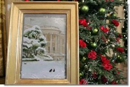 The painting by Jamie Wyeth that portrays a wintery White House as Barney, Miss Beazley and even, Willie the cat, is displayed in the East Room. The painting is the model for this year's White House Christmas Card.  White House photo by Shealah Craighead
