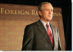 President George W. Bush is introduced at a meeting of the Council on Foreign Relations, Wednesday, Dec. 7, 2005 in Washington, where he spoke on the war on terror and the rebuilding of Iraq.  White House photo by Paul Morse