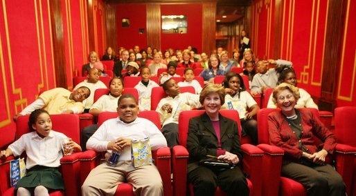 Students and their mentors from Everybody Wins! DC, a community-based mentoring program, joined Mrs. Laura Bush and her mother, Mrs. Jenna Welch, to watch C.S.Lewis' The Chronicles of Narnia: The Lion, The Witch, and The Wardrobe in the White House Theater. The students are from Robert Brent Elementary Schoool and the John Tyler Elementary School in Washington, D.C. Also in attendance were Mr. Douglas Gresham, stepson of C.S. Lewis; Ms. Mary Salander, executive director, Everybody Wins! DC; Ms. Pat Schroeder, president, American Publishing Association and Mr. Michael Flaherty, co-founder and president, Walden Media. White House photo by Shealah Craighead