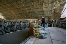 Vice President Dick Cheney attends a rally with US troops at Al-Asad Airbase in Iraq, Dec. 18, 2005.  White House photo by David Bohrer