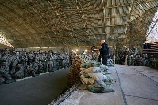Vice President Dick Cheney attends a rally with US troops at Al-Asad Airbase in Iraq, Dec. 18, 2005. White House photo by David Bohrer
