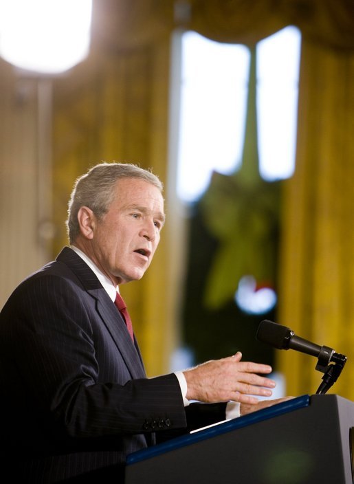 President George W. Bush addresses the media during a press conference Monday, Dec. 19, 2005, in the East Room of the White House. Before responding to reporters' questioning, the President, speaking on Iraq, told the gathering, ". This election does not mean the end of violence, but it is the beginning of something new: A constitutional democracy at the heart of the Middle East." White House photo by Paul Morse