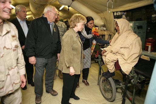 Vice President Cheney and Mrs. Lynne Cheney visit the 212th M.A.S.H.(Mobile Army Surgical Hospital) Unit run by the U.S. military in a mountainous area near the earthquake's epicenter, 65 miles northwest of Islamabad, Pakistan, Tuesday Dec. 20, 2005. During the visit the Vice President said he was "impressed with what we've been able to do with our M.A.S.H. units. U.S. forces were able to move quickly into the area. We were here within 48 hours and we've been here ever since." White House photo by David Bohrer