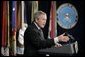 President George W. Bush gestures as he addresses his remarks on the global war on terror, Wednesday, Jan. 4, 2006, to an audience at the Pentagon, following a Department of Defense briefing with Secretary of Defense Donald Rumsfeld and Joint Chiefs of Staff General Peter Pace. White House photo by Eric Draper