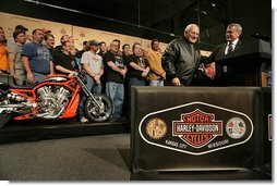 Vice President Dick Cheney wears a leather jacket given to him by Harley-Davidson CEO Jim Ziemer after touring the motorcycle plant and delivering remarks to the company’s employees in Kansas City, Friday January 6, 2006. During his remarks the Vice President said, “To have the experience of visiting this Harley-Davidson plant is to see, collected under one roof, so much of what is best in the American economy: the hard work, the commitment to quality, and the optimism that drives us forward.”  White House photo by David Bohrer