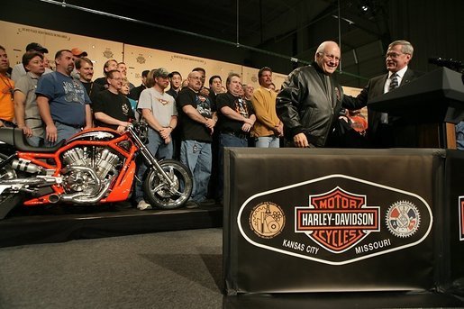 Vice President Dick Cheney wears a leather jacket given to him by Harley-Davidson CEO Jim Ziemer after touring the motorcycle plant and delivering remarks to the company’s employees in Kansas City, Friday January 6, 2006. During his remarks the Vice President said, “To have the experience of visiting this Harley-Davidson plant is to see, collected under one roof, so much of what is best in the American economy: the hard work, the commitment to quality, and the optimism that drives us forward.” White House photo by David Bohrer