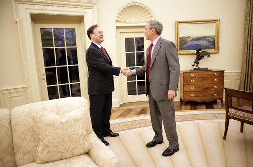 President George W. Bush and Judge Samuel A. Alito shake hands in the Oval Office of the White House Monday, Jan. 9, 2006, before breakfast in the Private Dining Room. Confirmation hearings for Judge Alito, President Bush's nominee for Associate Justice of the Supreme Court, were scheduled to begin today in Washington. White House photo by Eric Draper