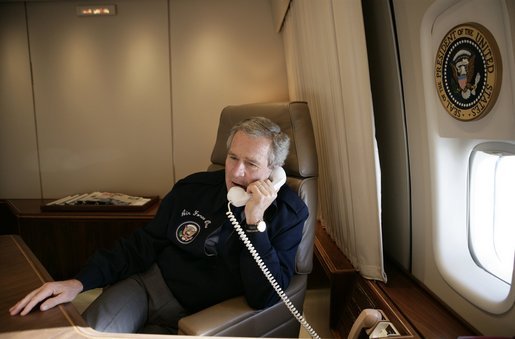 Calling from Air Force One, President George W. Bush talks with Supreme Court Associate Justice nominee Judge Samuel Alito Thursday, Jan. 12, 2006, on the final day of the judge's confirmation hearings before the Senate Judiciary Committee. White House photo by Eric Draper