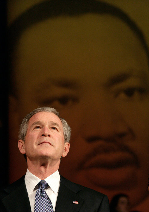 President George W. Bush looks up at the audience while taking the stage before his remarks at Georgetown University's "Let Freedom Ring" Celebration Honoring Dr. Martin Luther King at the John F. Kennedy Center for the Performing Arts, Monday, Jan. 16, 2006. White House photo by Eric Draper