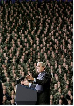 President George W. Bush delivers remarks on the global war on terror at Kansas State University in Manhattan, Kan., Monday, Jan. 23, 2006. Pictured behind the President are 1,000 military personnel from Fort Riley, Kan.  White House photo by Eric Draper