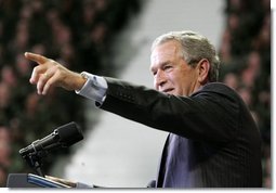 President George W. Bush takes one of many questions from an enthusiastic audience during his remarks on the War on Terror at Kansas State University in Manhattan, Kan., Monday, Jan. 23, 2006.  White House photo by Eric Draper
