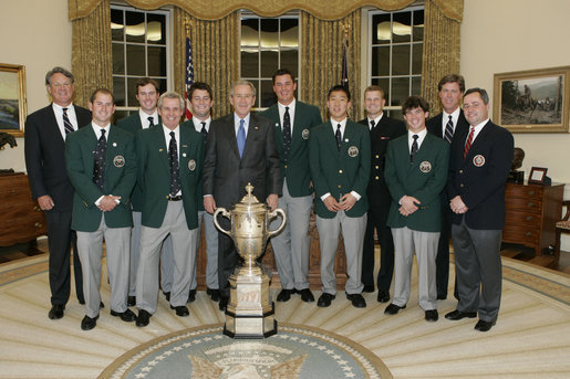 President George W. Bush meets with members of the U.S. Walker Cup Team in the Oval Office at the White House, Monday evening, Jan. 23, 2006. White House photo by Kimberlee Hewitt