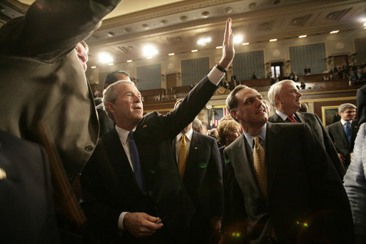 President George W. Bush waves toward the upper visitors gallery of the House Chamber following his State of the Union remarks Tuesday, Jan. 31, 2006 at the United States Capitol. White House photo by Eric Draper