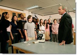 President George W. Bush speaks with science and engineering students after touring the Yvonne A. Ewell Townview Magnet Center in Dallas, Texas, Friday, Feb. 3, 2006. White House photo by Eric Draper