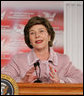 Mrs. Laura Bush addresses an audience Friday, Feb. 3, 2006 in Rio Rancho, New Mexico, reminding people of the proclamation signed by President George W. Bush earlier in the day making February American Heart Month, and encouraging Americans to remember that heart disease is the number one killer and to take efforts through healthy eating, exercise and regular check-ups to prevent heart disease. White House photo by Eric Draper