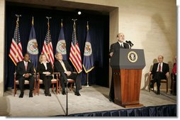 With his predecessor, Alan Greenspan, looking on, Chairman Ben Bernanke addresses President George W. Bush and others after being sworn in to the Federal Reserve post. Also on stage with the President are Mrs. Anna Bernanke and Roger W. Ferguson, Jr., Vice Chairman of the Federal Reserve.  White House photo by Kimberlee Hewitt