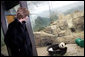 Mrs. Laura Bush watches baby Giant Panda, Tai Shan, play Tuesday, Feb. 14, 2006, at the Smithsonian National Zoological Park in Washington, DC. The Giant Panda is 7 months old and weighs over 33lbs. White House photo by Shealah Craighead