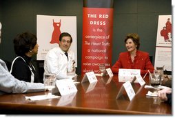 Laura Bush participates in a roundtable with Delphia Daniel, heart disease survivor, and Dr. Paul Colavita, Cardiologist, Sanger Clinic, at Carolinas Medical Center Wednesday, Feb. 15, 2006, in Charlotte, NC, to promote heart disease awareness, education and prevention. Heart disease is the leading cause of death of women in the US. White House photo by Shealah Craighead