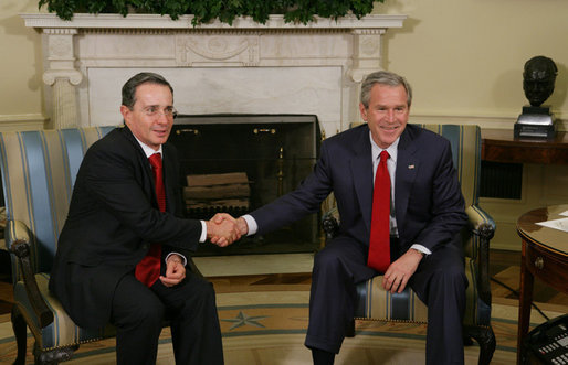 President George W. Bush welcomes President Alvaro Uribe of Colombia to the Oval Office, Thursday, Feb. 16, 2006. White House photo by Paul Morse