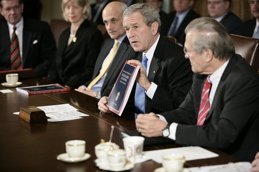 President George W. Bush holds a copy of the newly released report, The Federal Response to Hurricane Katrina: Lessons Learned, while talking to reporters at a Cabinet meeting Thursday, Feb. 23, 2006 at the White House. The report reviews the federal response to Katrina and makes recommendations about how to better respond in the future. White House photo by Eric Draper