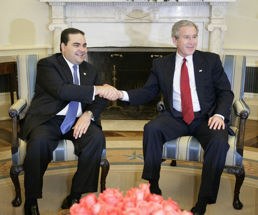President George W. Bush welcomes President Antonio Saca of El Salvador to the Oval Office, Friday, Feb. 24, 2006 at the White House. White House photo by Eric Draper