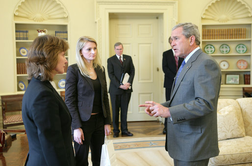 President George W. Bush greets Irina Krasovskaya, left, and Svyatlana Zavadskaya, widows of a pro-democracy businessman and an independent journalist who "disappeared" in Belarus in 1999 and 2000 respectively. During a meeting on Monday, February 27, 2006 at the White House, the President discussed the state of democracy and human rights in Belarus in the run-up to the March 19 Belarusian presidential election, and stressed his commitment to support the people of Belarus in their effort to determine their own future. The United States is deeply concerned about the Belarusian government's conduct leading up to the election, harassment of civil society, and failure to investigate seriously the cases of the disappeared. White House photo by Paul Morse