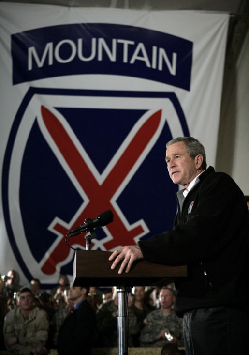 President George W. Bush addresses U.S. and Coalition troops Wednesday, March 1, 2006, during a stopover at Bagram Air Base in Afghanistan, prior to his visit to India and Pakistan. White House photo by Eric Draper
