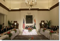 President George W. Bush and Prime Minister Manmohan Singh of India, lead a meeting Thursday, March 2, 2006, with U.S. and Indian CEOs.  White House photo by Eric Draper