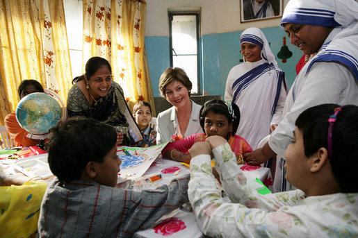 Mrs. Laura Bush meets with teachers and children, Thursday, March 2, 2006, during her visit to Mother Teresa's Jeevan Jyoti (Light of Life) Home for Disabled Children in New Delhi, India. White House photo by Shealah Craighead