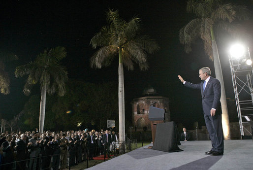 President George W. Bush waves as he leaves the stage Friday, March 3, 2006, after delivering remarks at Purana Qila in New Delhi before departing India for Pakistan. White House photo by Eric Draper