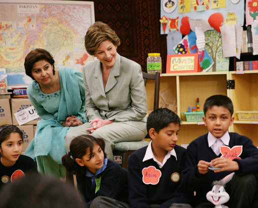Mrs. Laura Bush listens to a student answer a question as she attends a class lesson in the Children's Resources International clasroom at the U.S. Embassy , Saturday, March 4, 2006 in Islamabad, Pakistan. White House photo by Shealah Craighead