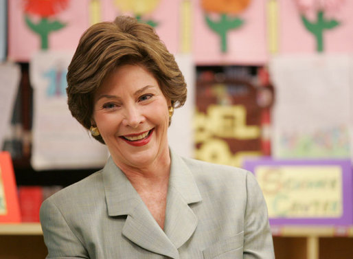Mrs. Laura Bush reacts to a question as she attends a class lesson in the Children's Resources International clasroom at the U.S. Embassy , Saturday, March 4, 2006 in Islamabad, Pakistan. White House photo by Shealah Craighead