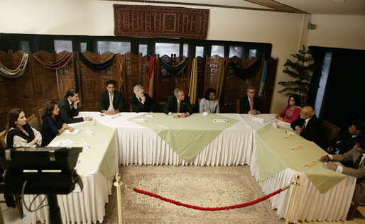 President George W. Bush meets with participants, Saturday, March 4, 2006 at the Roundtable with Pakistani Society Representatives at the U.S. Embassy in Islamabad, Pakistan. White House photo by Eric Draper