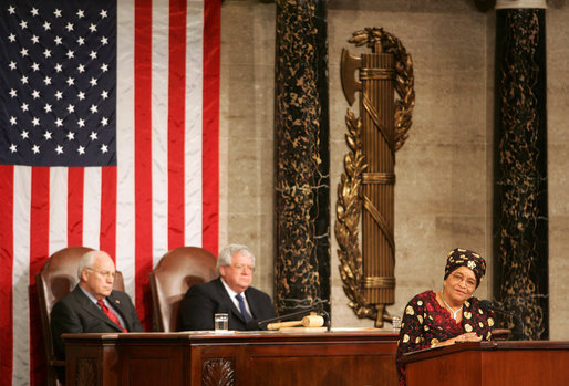 Vice President Dick Cheney and House Speaker J. Dennis Hastert listen as President Ellen Johnson-Sirleaf, Liberia and Africa’s first female head-of state, addresses a Joint Meeting of Congress held in her honor at the Capitol, Wednesday, March 15, 2006. White House photo by David Bohrer