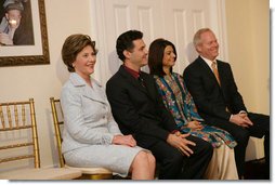 Mrs. Laura Bush attends the Afghan Children's Initiative Benefit Dinner at the Afghanistan Embassy in Washington, DC on Thursday evening, March 16, 2006. Seated with Mrs. Bush are Dr. Khaled Hosseini, author of The Kite Runner; Mrs. Shamim Jawad, host and wife of the Afghan Ambassador to the U.S.; and Mr. Tim McBride, member of the U.S.-Afghan Women's Council.  White House photo by Shealah Craighead