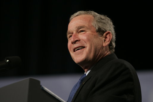 President George W. Bush reacts to a question from the audience at the Renaissance Cleveland Hotel in Cleveland, Ohio, while delivering his remarks on the global war on terror, Monday, March 20, 2006, to members of the City Club of Cleveland. White House photo by Paul Morse