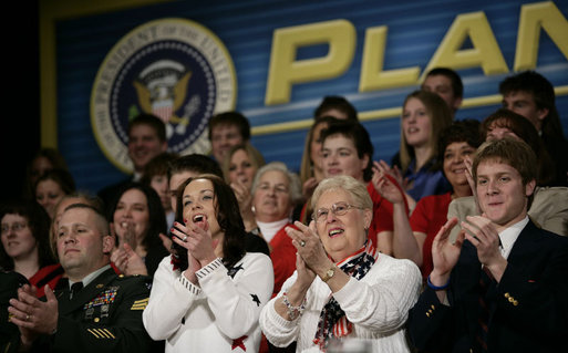 Audience members applaud President George W. Bush as he discusses the global war on terror, Wednesday, March 22, 2006 at the Capitol Music Hall in Wheeling, W. Va. President Bush told the crowd that America has got to appreciate what it means to wear the uniform today, and honor those who have volunteered to keep this country strong. White House photo by Eric Draper