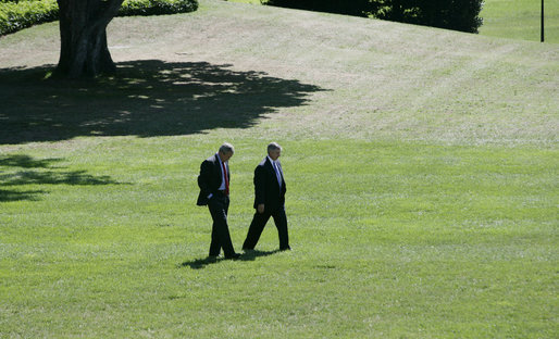 President George W. Bush and Chief of Staff Andrew Card walk alone on the South Lawn in this September 2005 file photo. President Bush announced Tuesday, March 28, 2006, that he had accepted Secretary Card's resignation, effective in April. White House photo by Eric Draper