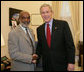 President George W. Bush meets with President-elect Rene Preval of Haiti at the White House, Tuesday, March 28, 2006 in Washington. White House photo by Kimberlee Hewitt
