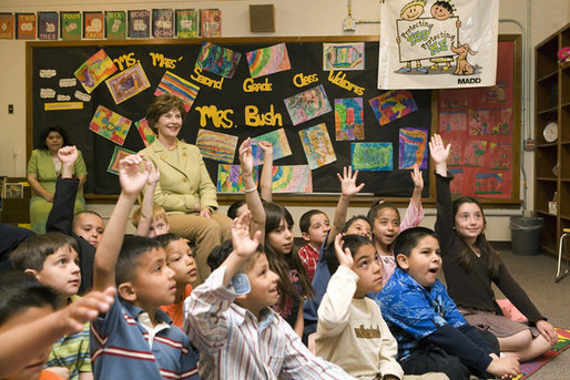 Mrs. Laura Bush sits with Mrs. Jessica Maes’s second grade class at Bel Air Elementary School in Albuquerque, N.M., Monday, April, 3, 2006, during a lesson called Protecting You/Protecting Me, to teach the prevention of substance and alcohol abuse. Protecting You/Protecting Me is a curriculum developed and supported by Mothers Against Drunk Driving, for children in grades 1-5, focusing on the effects of alcohol on the developing brain during the first 21 years of life. White House photo by Shealah Craighead
