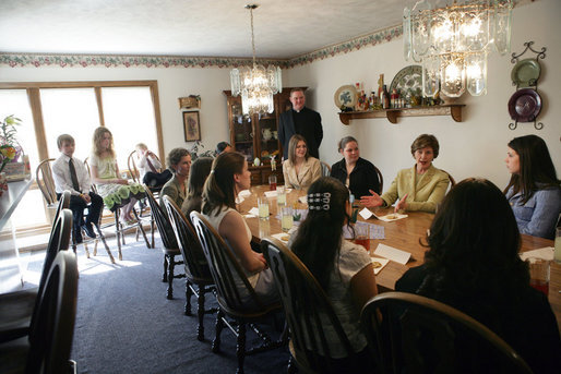 Mrs. Laura Bush visits with high school girls who are living in a family-style residential group home at Father Flanagan’s Girls & Boys Town in Omaha, NE, Monday, April 3, 2006. The program applies a behavior treatment model for delinquent youths ages 10-18 that emphasizes positive relationships, teaching skills, self control, while supporting moral and spiritual development and promoting self-government and self-determination. White House photo by Shealah Craighead