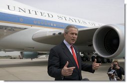 Standing outside Air Force One in Charlotte, N.C., President George W. Bush addresses the media after speaking about the War on Terror at Central Piedmont Community College Thursday, April 6, 2006. White House photo by Paul Morse