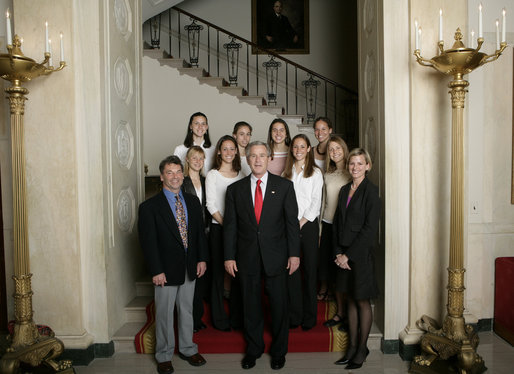 President George W. Bush stands with members of the Stanford University Women’s Cross Country Team Thursday, April 6, 2006, during a photo opportunity with the 2005 and 2006 NCAA Sports Champions at the White House. White House photo by Eric Draper