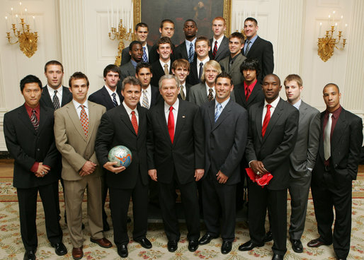President George W. Bush stands with members of the University of Maryland Men’s Soccer Team Thursday, April 6, 2006, during a photo opportunity with the 2005 and 2006 NCAA Sports Champions at the White House. White House photo by Kimberlee Hewitt